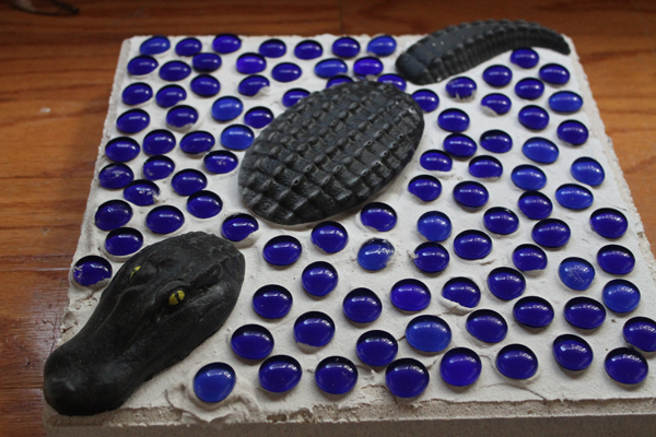 Gator with tile repair mortar