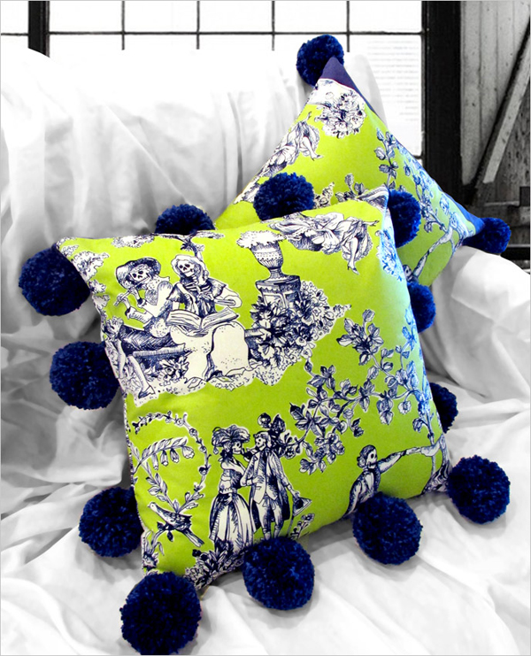 A Pillow with Giant Pom Poms